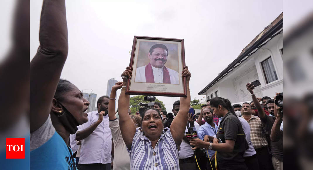 Outgoing Sri Lankan PM Mahinda Rajapaksa evacuated by troops – Times of India