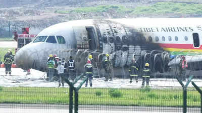 Chinese jet aborts takeoff, catches fire, causing minor injuries from evacuation