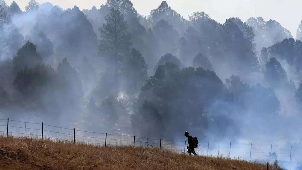 Wildfires rage western US