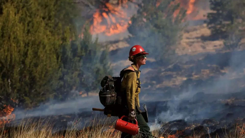 Wildfires rage western US