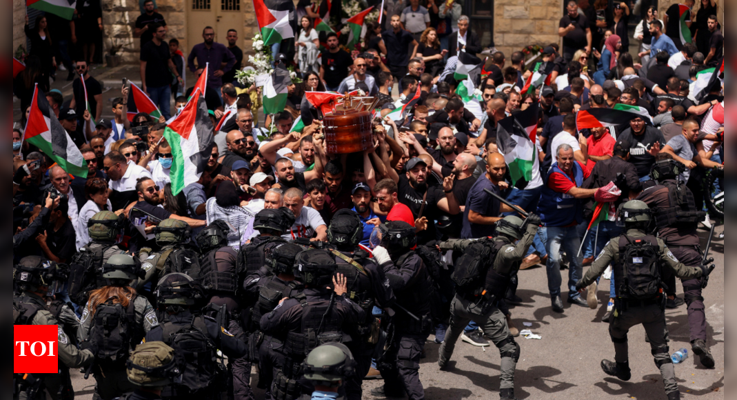 Israeli police beat mourners at funeral of slain Palestinian journalist – Times of India