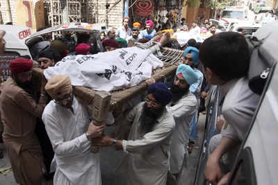 India asks Pakistan to punish those behind killing of 2 Sikh businessmen
