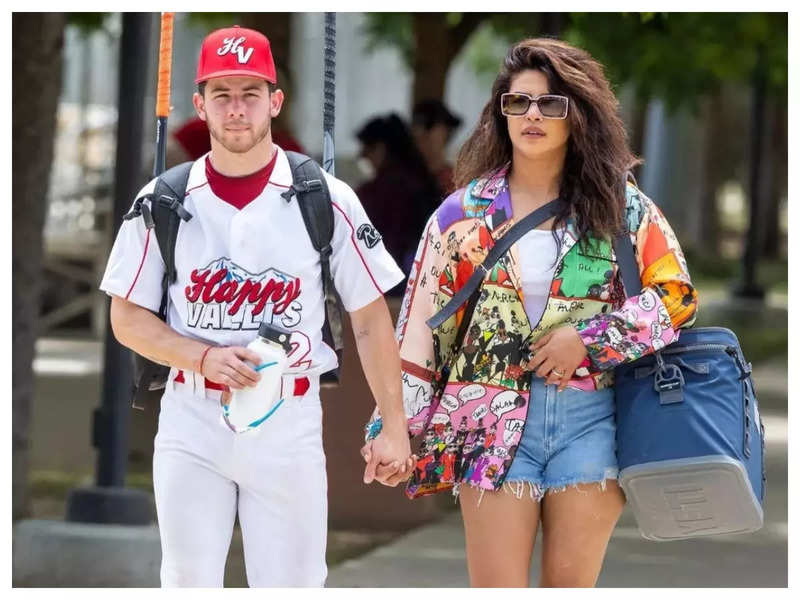 Priyanka Chopra and Nick Chopra look uber stylish as they walk hand-in-hand after a softball game in Los Angeles – See photo