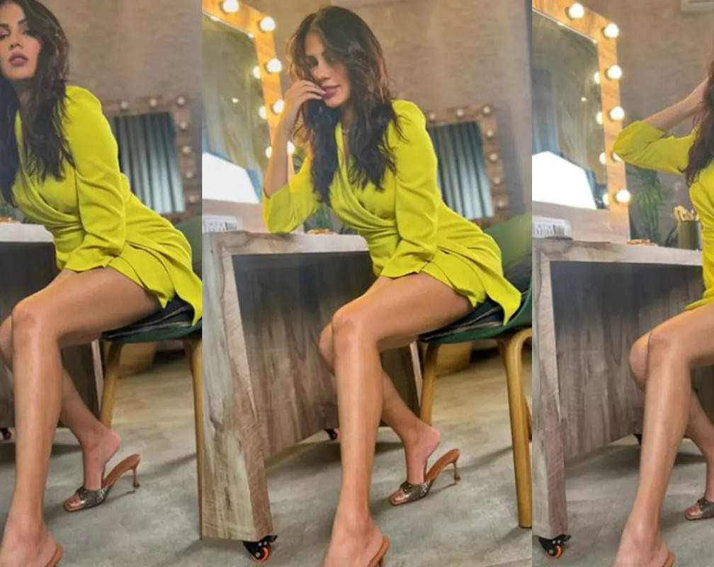 
Rhea Chakraborty sets social media ablaze with her ravishing pics in this short dress!
