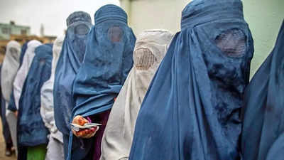 Taliban: Afghanistan: UN female staff 'directed' to wear hijab at ...