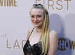 
Dakota Fanning wears a necklace with her dead dog's hair
