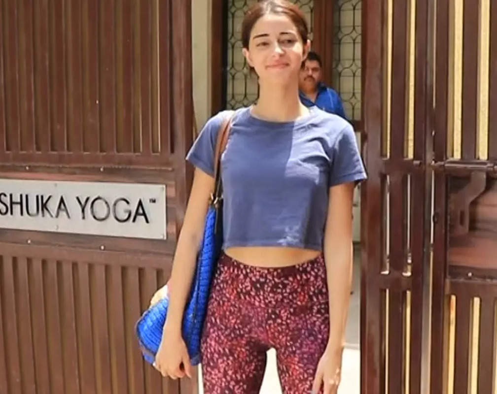 
Ananya Panday gets snapped in purple coloured casual top and leggings as she steps out of a yoga centre
