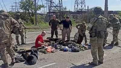 Russia says almost 2,000 Ukrainian fighters from Azovstal have surrendered so far
