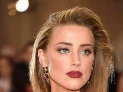 What is Amber Heard’s dating history?