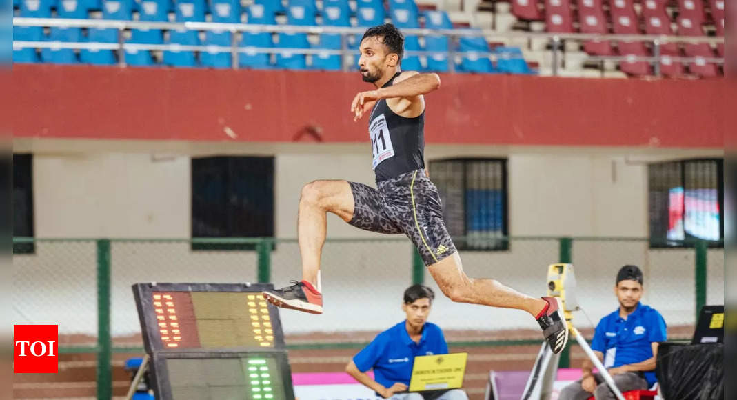 India's Abdulla Aboobacker Narangolintevida competes during the