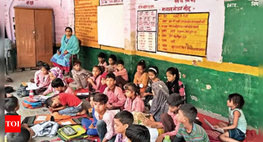 1 teacher for 5 classes, children troop in for midday meals only