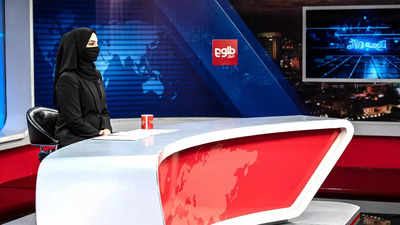 Afghan women TV presenters cover faces on air