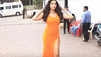 Nora Fatehi oozes confidence and elegance in bright orange dress