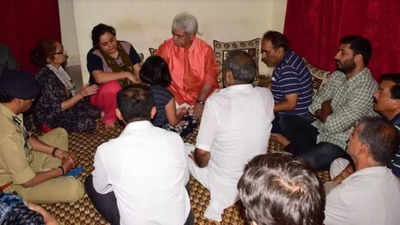 Jammu and Kashmir LG Manoj Sinha visits family of Rahul Bhat killed by terrorists