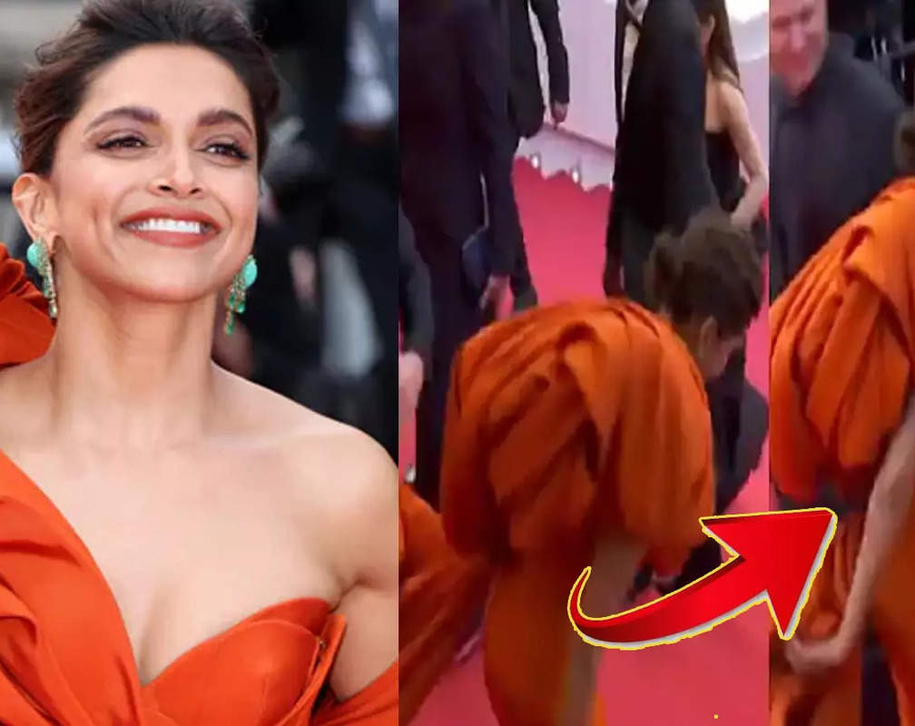 
Cannes red carpet: Deepika Padukone stuns in an orange gown but struggles to walk and climb stairs
