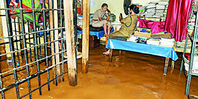 After a two-day pause, pounding rain floods schools & police station