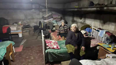 Ukraine shelter residents mark each day alive with a red cross