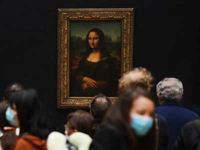 Mona Lisa: Man arrested after smearing Mona Lisa with cake at Louvre ...