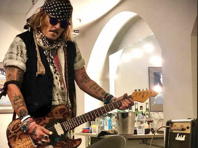 Johnny Depp gets a standing ovation at Royal Albert Hall as he awaits verdict in defamation case against Amber Heard - WATCH