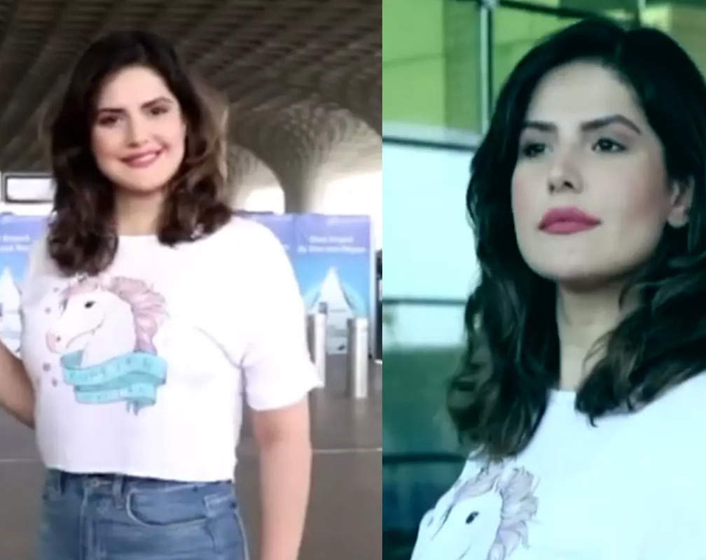 
Zareen Khan poses for shutterbugs as she gets spotted at airport

