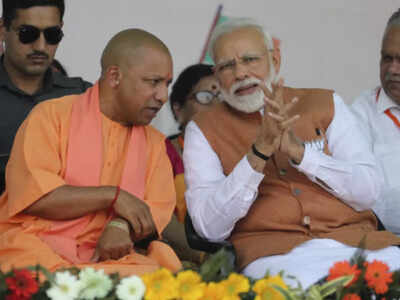 PM Modi wishes Yogi Adityanath on 50th birthday | India News - Times of ...
