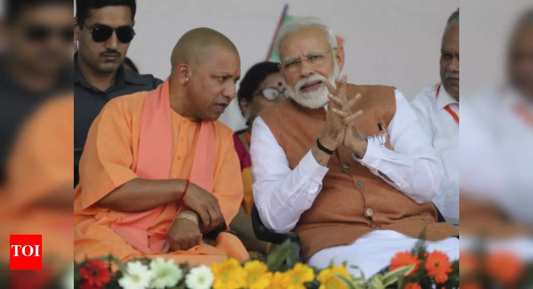 PM Modi wishes Yogi Adityanath on 50th birthday | India News - Times of ...