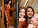 Priyanka Chopra dazzles in a sequined dress as she poses with Anne Hathaway and BLACKPINK's Lisa