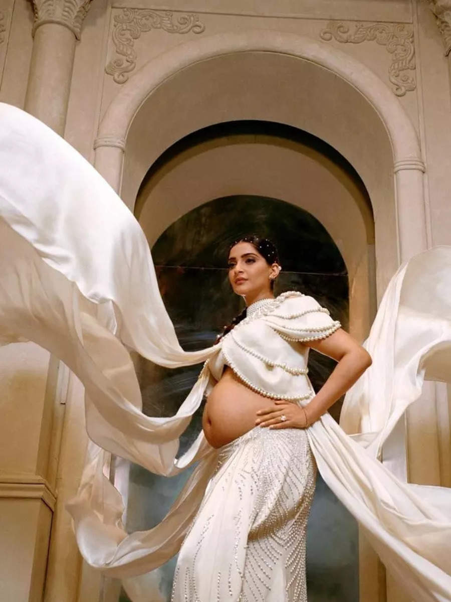 Preggers Sonam Kapoor is a vision in white in mother Sunita