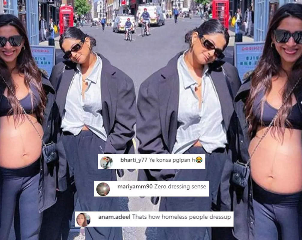 
Mom-to-be Sonam Kapoor gets trolled for flaunting her baby bump in unbuttoned shirt, netizens say 'Looks like halwaai wale uncle'
