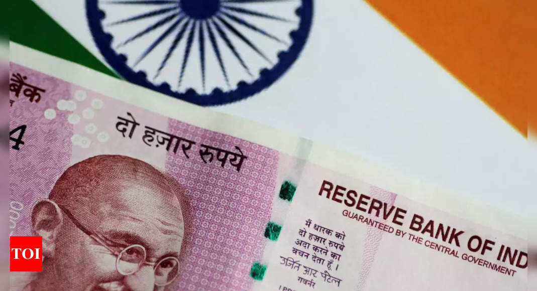 Rupee: Rupee hits record low, 10-yr bond yields hits over 3-yr high | India Business News – Times of India