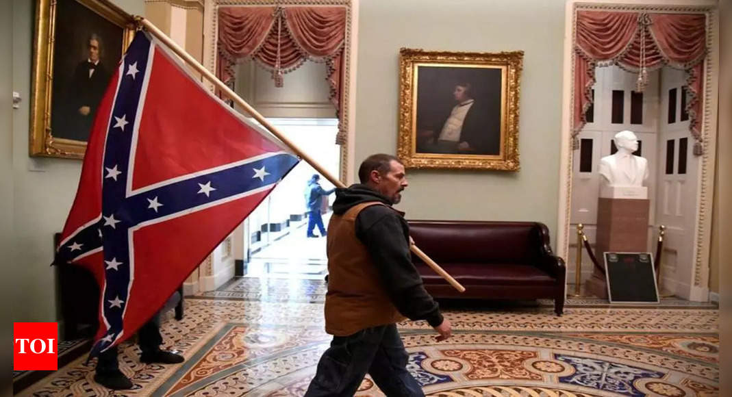 capitol: Man who carried Confederate flag into Capitol heads to trial – Times of India