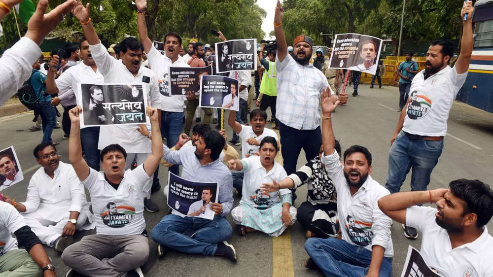 Photos: Rahul appears before ED amid protest by Congress workers