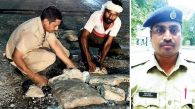 Kanpur: RPF constable goes beyond duty to secure pothole on road
