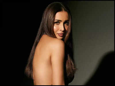 Malaika Arora makes heads turn in a backless dress; BFF Kareena Kapoor Khan asks, 'Who you lookinn at?'