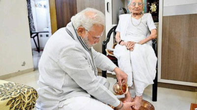 PM Narendra Modi with mother Heeraba in Gandhinagar on Saturday