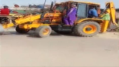 Uttar Pradesh: Groom rides bulldozer to reach marriage venue in Bahraich