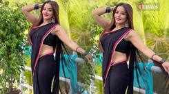 Monalisa shows her beauty in a black saree