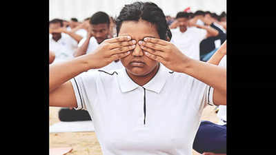 Karnataka: Yoga enthusiasts hit the mat, stretch in style