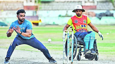 In a league of their own: Wheelchair cricketers win games & hearts