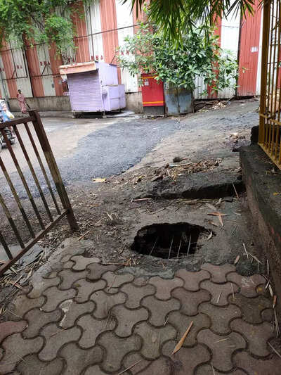 Footpath broken within few months - Times of India
