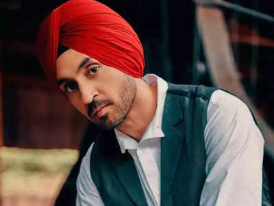 Diljit Dosanjh falls at the feet of YouTuber Lilly Singh's mom at Toronto concert