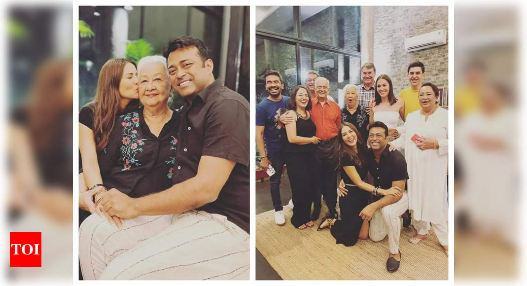 Kim Sharma holds beau Leander Paes shut as they pose for a gaggle image at her mom’s 80th birthday bash | Hindi Film Information