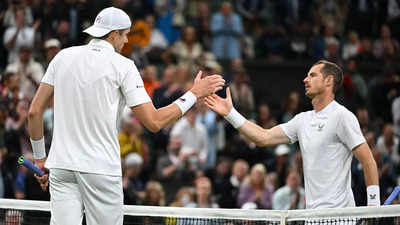 Wimbledon: John Isner sends Andy Murray crashing out in four sets