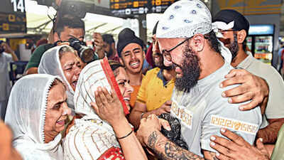 11 Afghan Sikhs arrive, bring ashes of terror victim | Delhi News ...