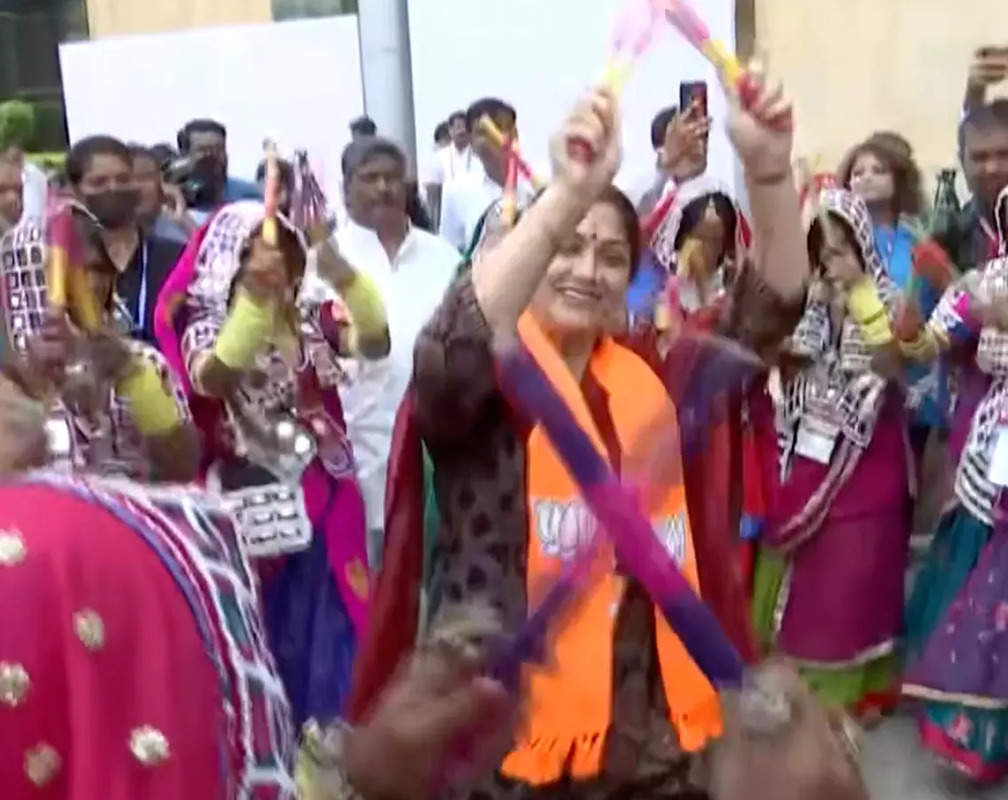 
Hyderabad: BJP leader Khushbu Sundar dances with artists outside International Convention Centre
