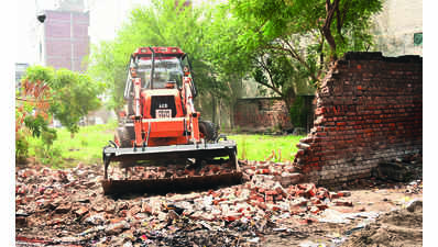 Bulldozers in, encroachers out: Structures along Buddha Nullah pave way for road