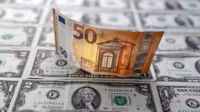 Euro plunges to two-decade low vs dollar as economic fears mount