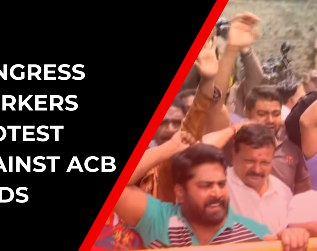 
Cong workers protest after ACB raid held at the properties belonging to MLA BZ Zameer Ahmed Khan

