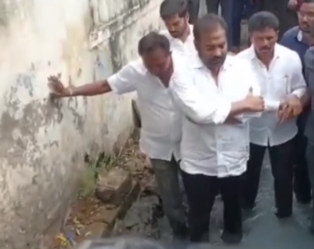 
AP: Nellore MLA sits in overflowing drain to protest against the issue
