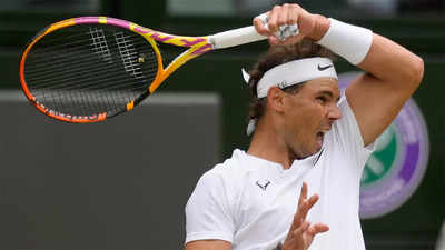 Rafael Nadal pulls out of Wimbledon semi-final with abdominal injury